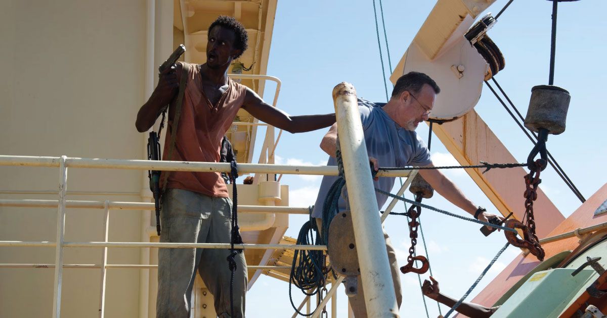 Captain Phillips and an armed pirate 