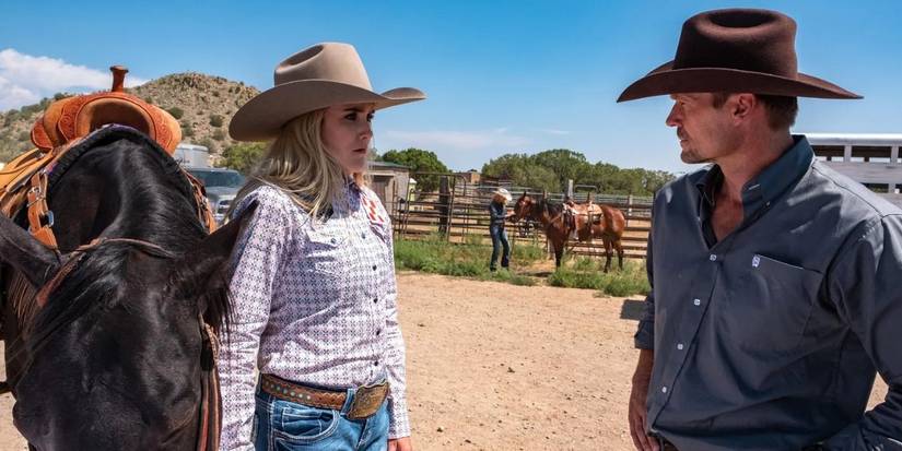 Katee Sackhoff and Bailey Chase standing in a ranch
