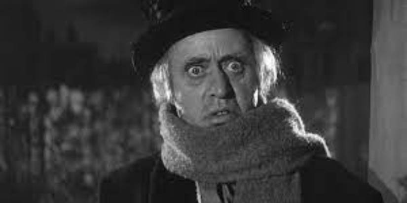 Alastair Sims as Ebenezer Scrooge Staring at the Camera in Scrooge 1951 (1)