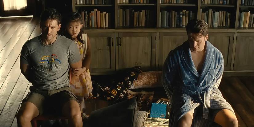 Ben Aldridge as Ben and Jonathan Groff as Andrew tied up in Knock at the Cabin