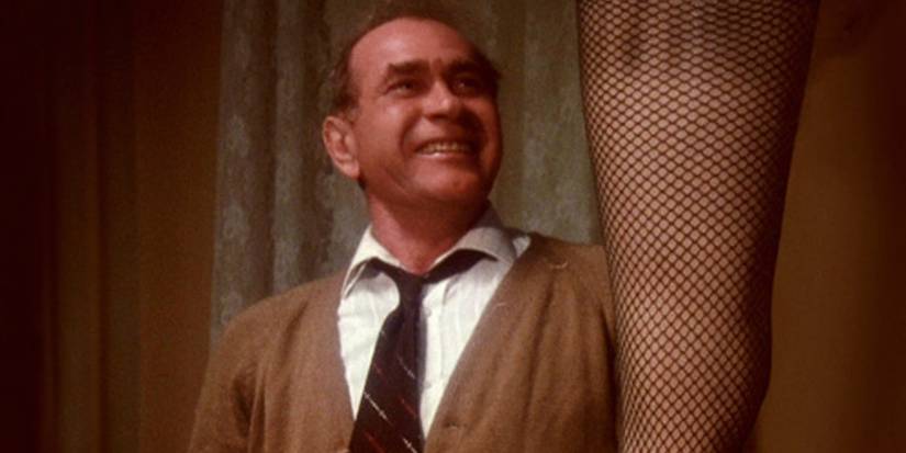 Darren McGavin admires leg lamp in A Christmas Story (1983)