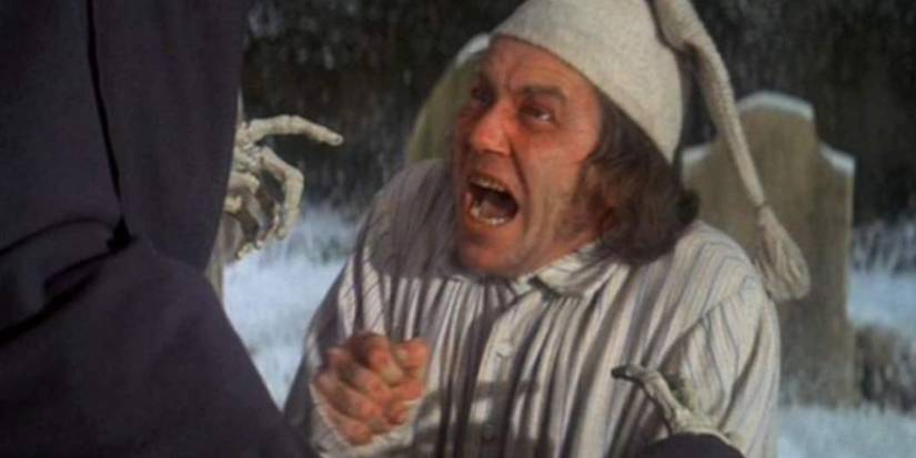 Ebenezer Scrooge Screaming at the Ghost of Christmas Future in Scrooge 1970