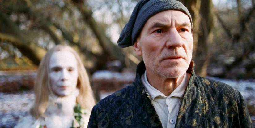 Ebenezer Scrooge Standing with the Ghost of Christmas Past in A Christmas Carol 1999