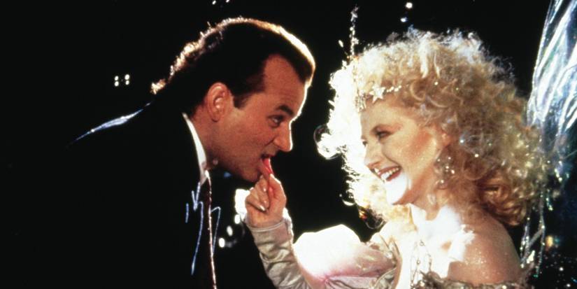 Frank Cross Getting His Lip Pulled by the Ghost of Christmas Past in Scrooged