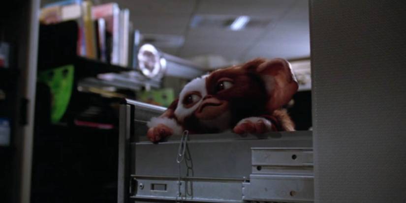 the creature gizmo tries to climb down a drawer in gremlins 2 the new batch