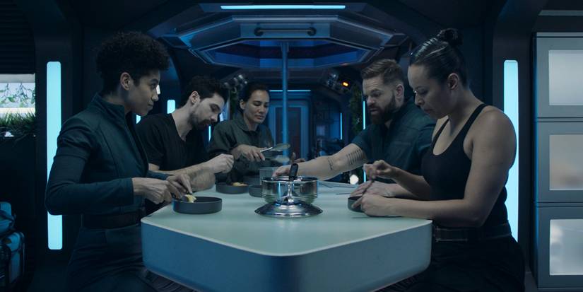 The crew eats a meal together in 'The Expanse'