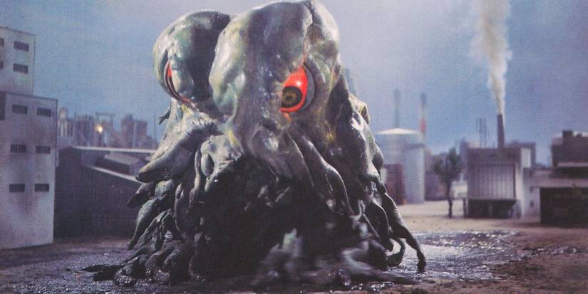 Hedorah standing in an industrial area in Godzilla vs. Hedorah (1971)