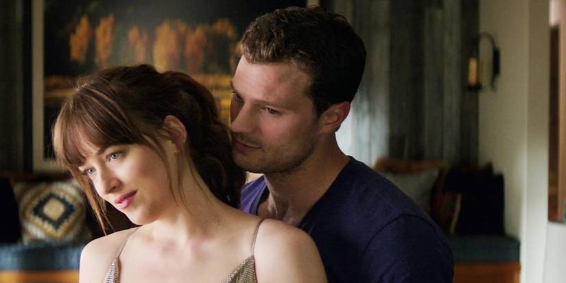 Ana and Christian embrace in Fifty Shades of Grey