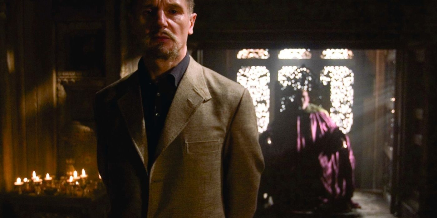 Liam Neeson's Ducard standing in front of Ken Watanabe's decoy Ra's al Ghul in Batman Begins