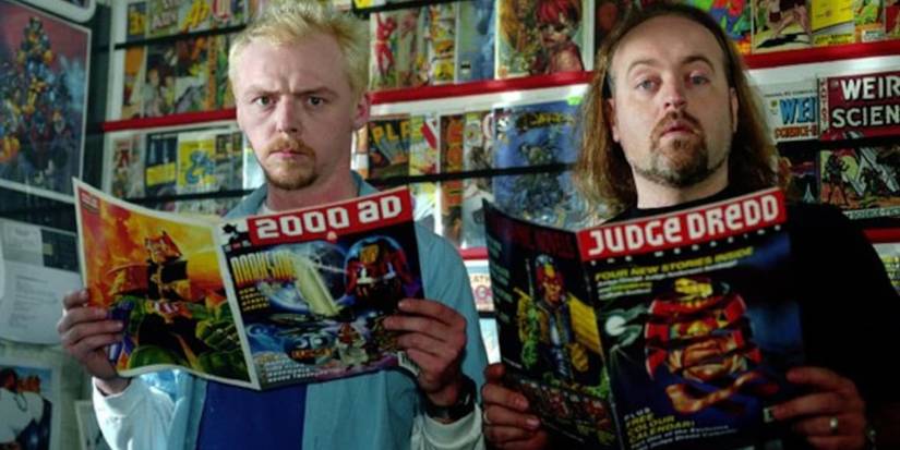 Two young man read comics in the tv show spaced