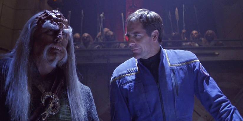 Scott Bakula as Archer and J.G. Hertzler as Advocate Kolos standing in court in Star Trek: Enterprise episode Judgement