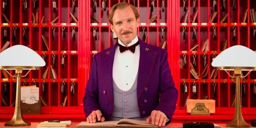 The Grand Budapest Hotel Gustave at the front desk of the hotel