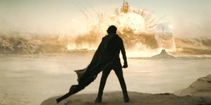 Timothee Chalamet as Paul Atreides standing in front of an explosion in Dune Part Two