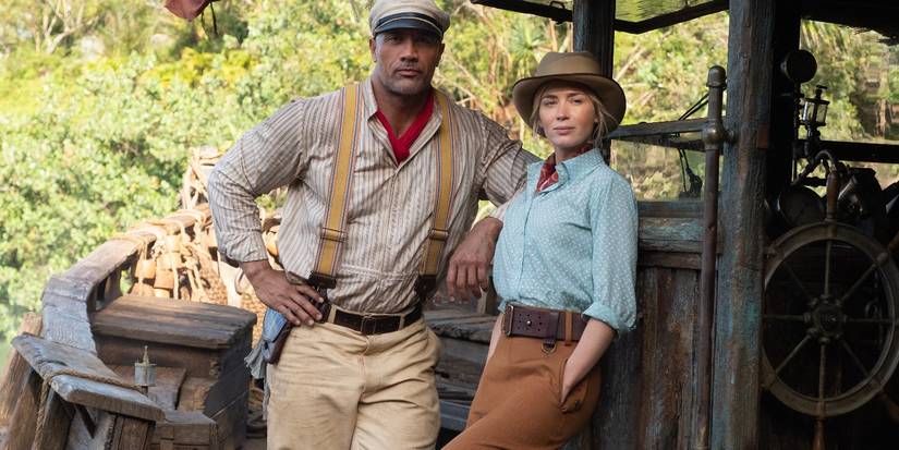 Dwayne Johnson's Frank Wolff and Emily Blunt's Dr. Lily Houghton aboard a boat in Jungle Cruise