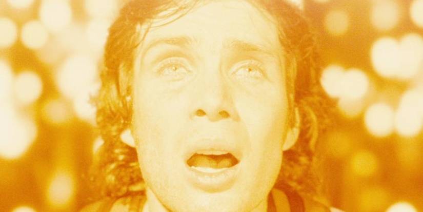 cillian murphy stares at a huge shining object in the film sunshine