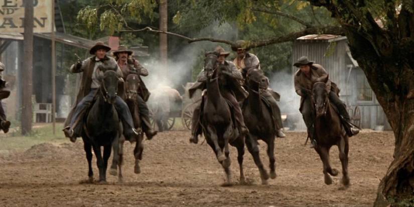 Younger Brothers firing guns riding through a small Western town in The Long Riders