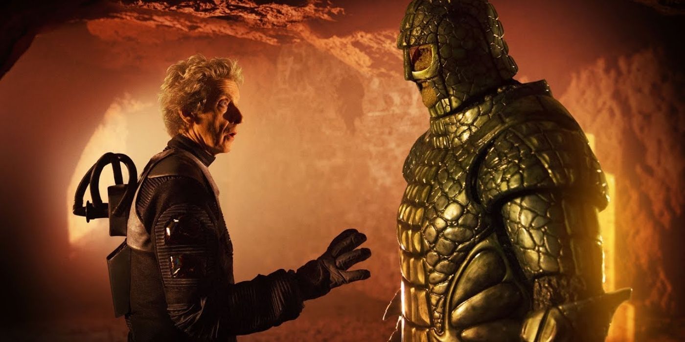 the twelfth doctor peter capaldi and an ice warrior a reptilian and armored alien 1
