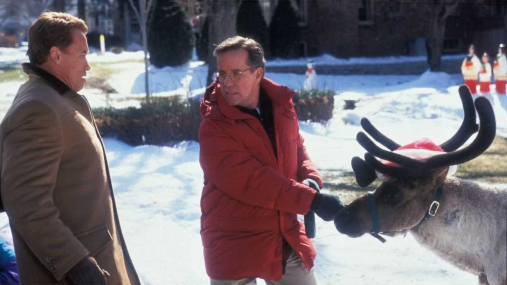Phil Hartman appears in Jingle All the Way next to a reindeer in the snow
