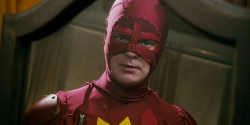 Rainn Wilson as Frank Darbo looking in a mirror in Super (2010)