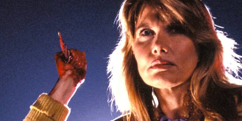 Maud Adams is about to stab someone in Silent Night, Deadly Night 4