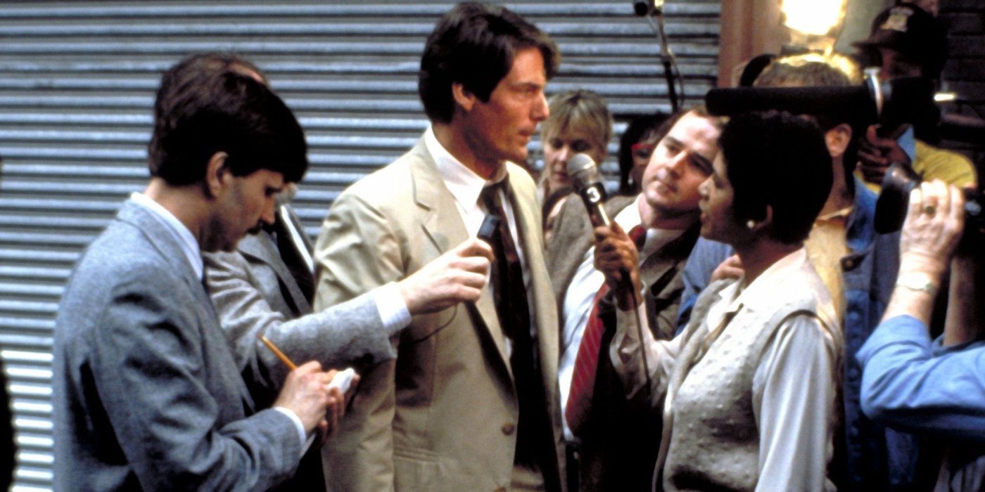 Christopher Reeve in Street Smart wearing a long brown coat with people interviewing him