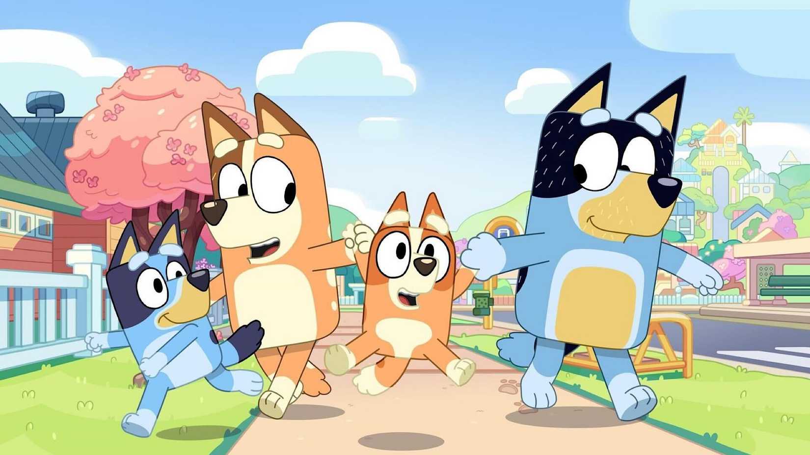 Bluey characters dancing down the street
