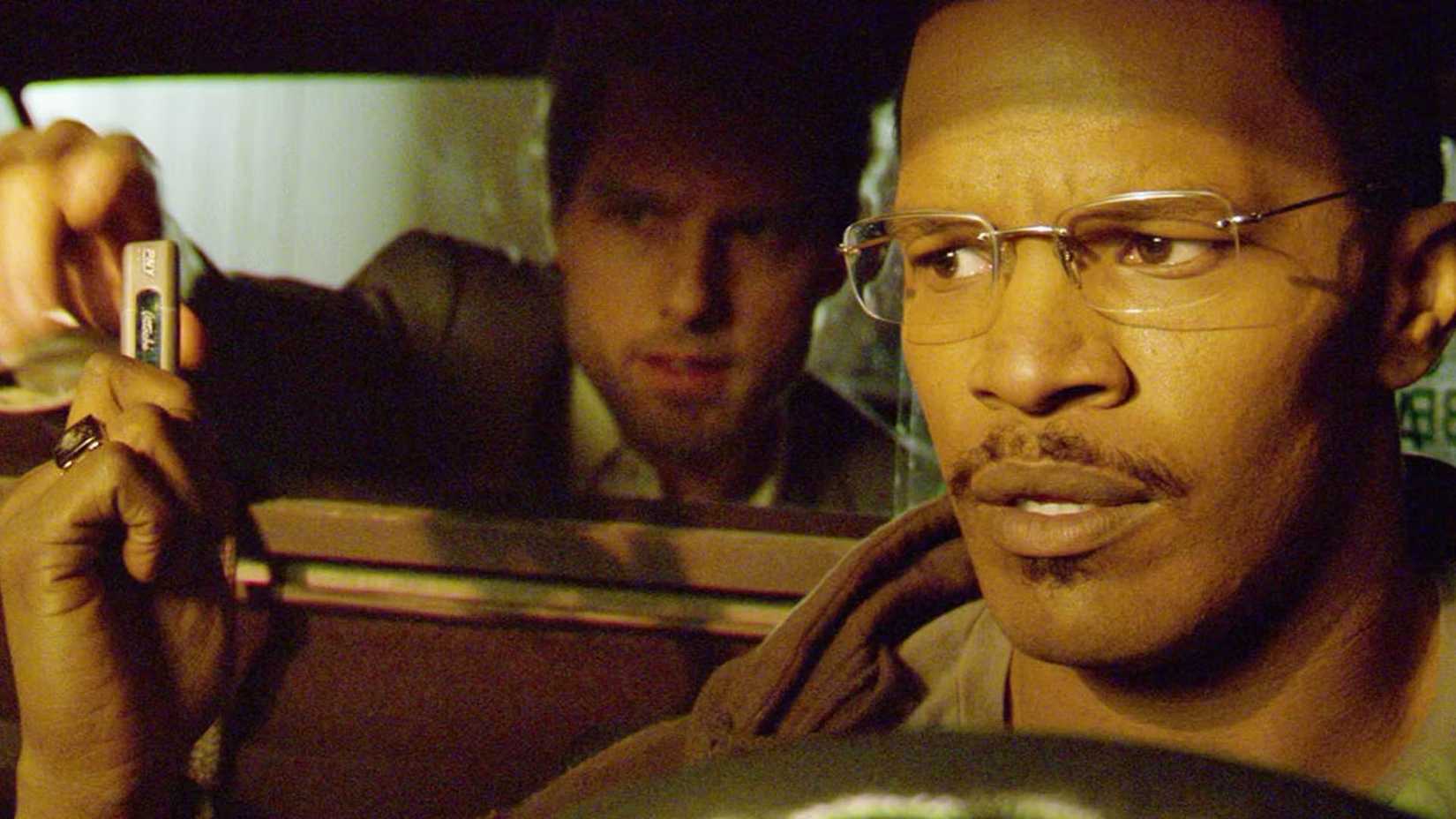 Jamie Foxx talking to Tom Cruise in the back of his cab in Collateral