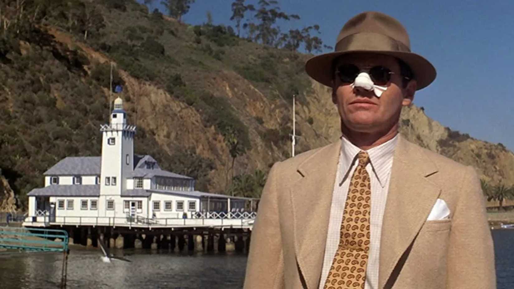 Jack Nicholson with a bandaged nose in Chinatown