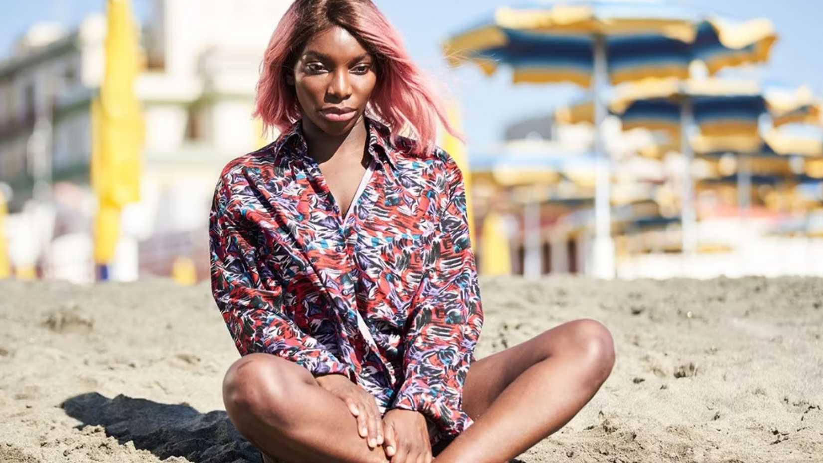 Michaela Coel as Arabella sitting on a beach in I May Destroy You