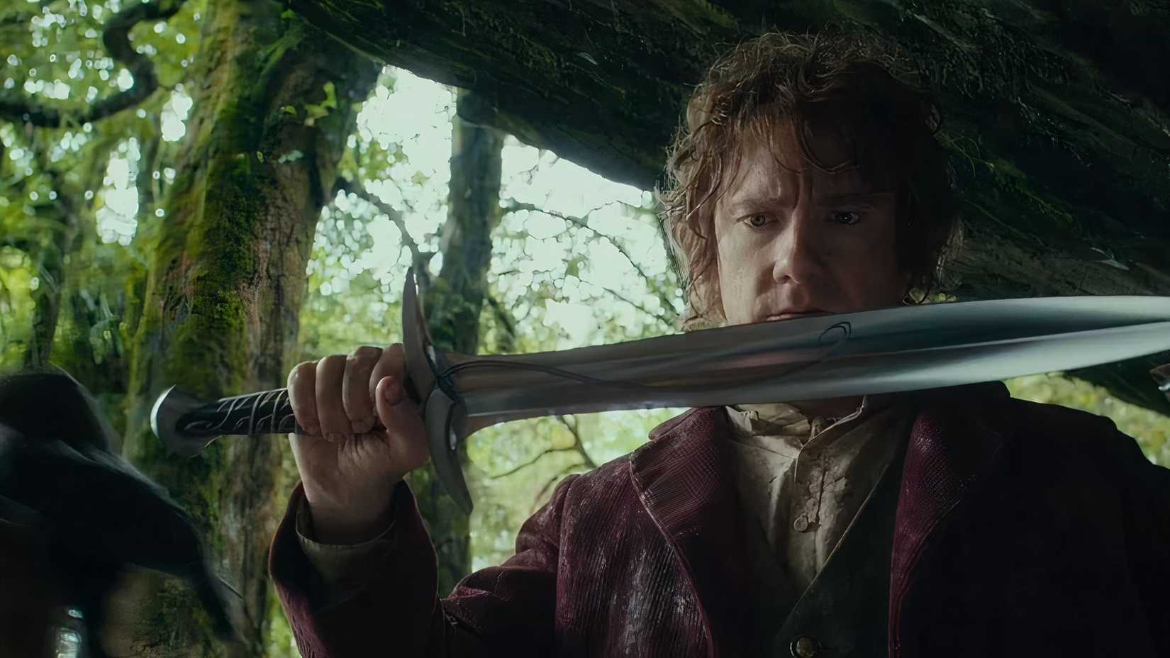 Bilbo holding the sword, Sting, in An Unexpected Journey