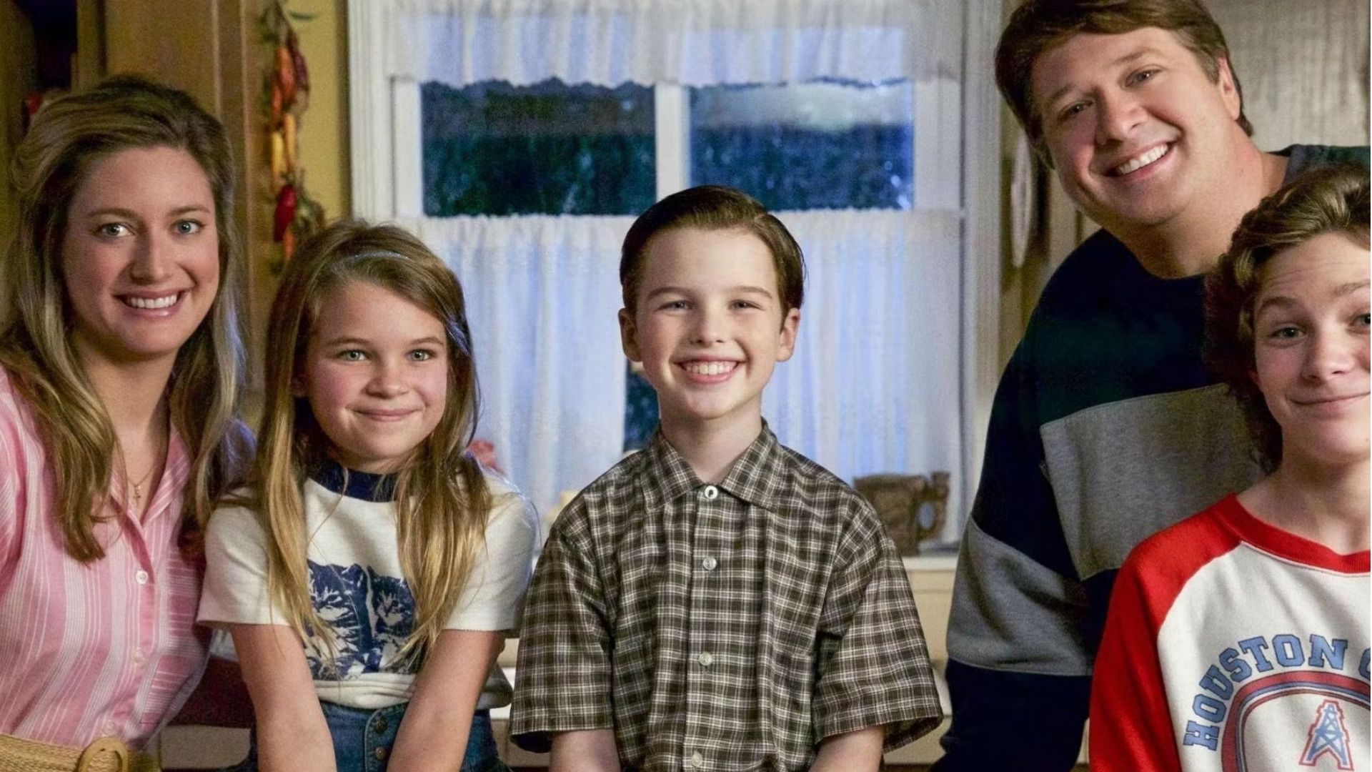 The cast of Young Sheldon is seen in a promotional shot.