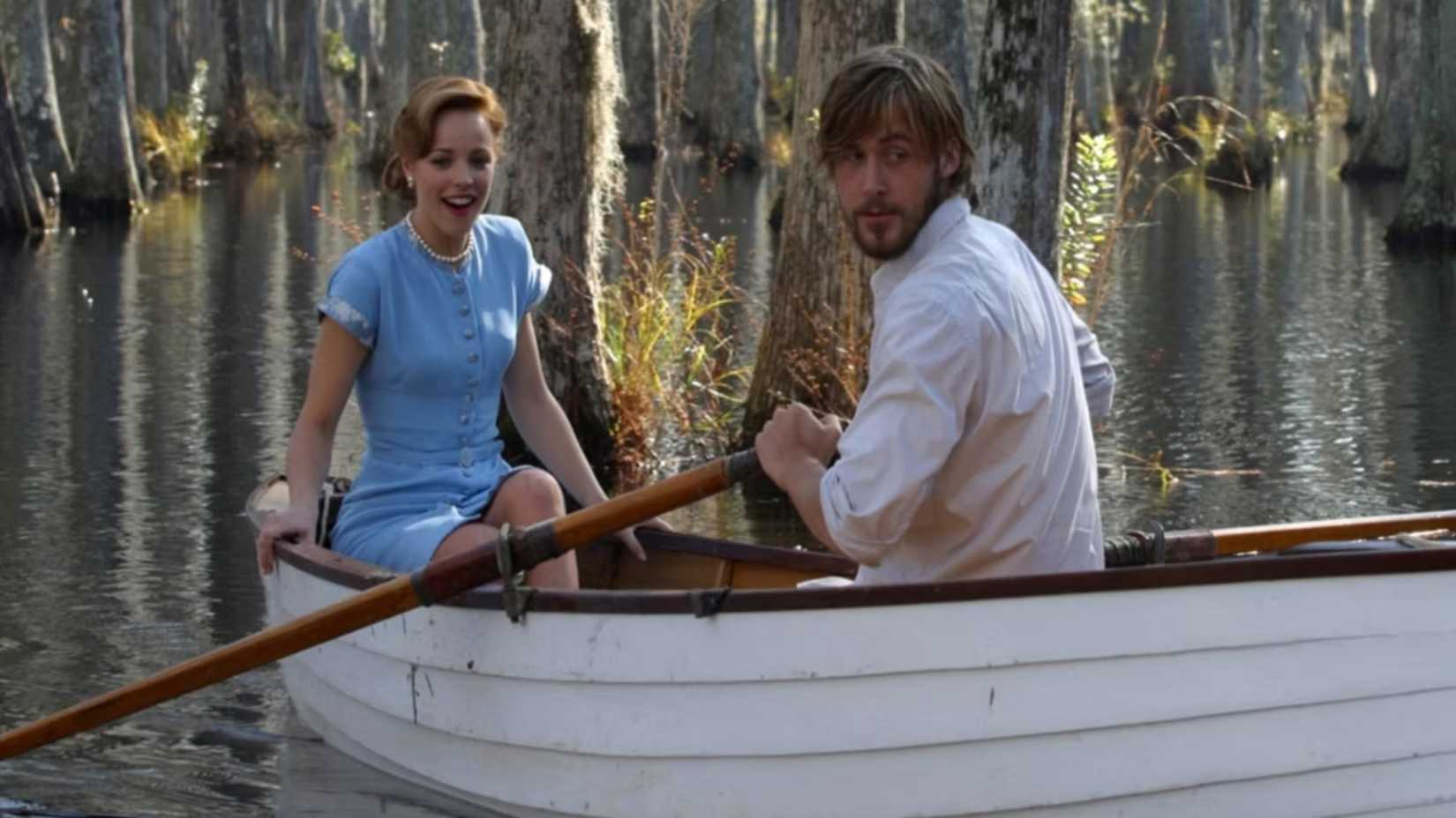 ryan gosling and rachel mcadams in a rowboat in the notebook 1