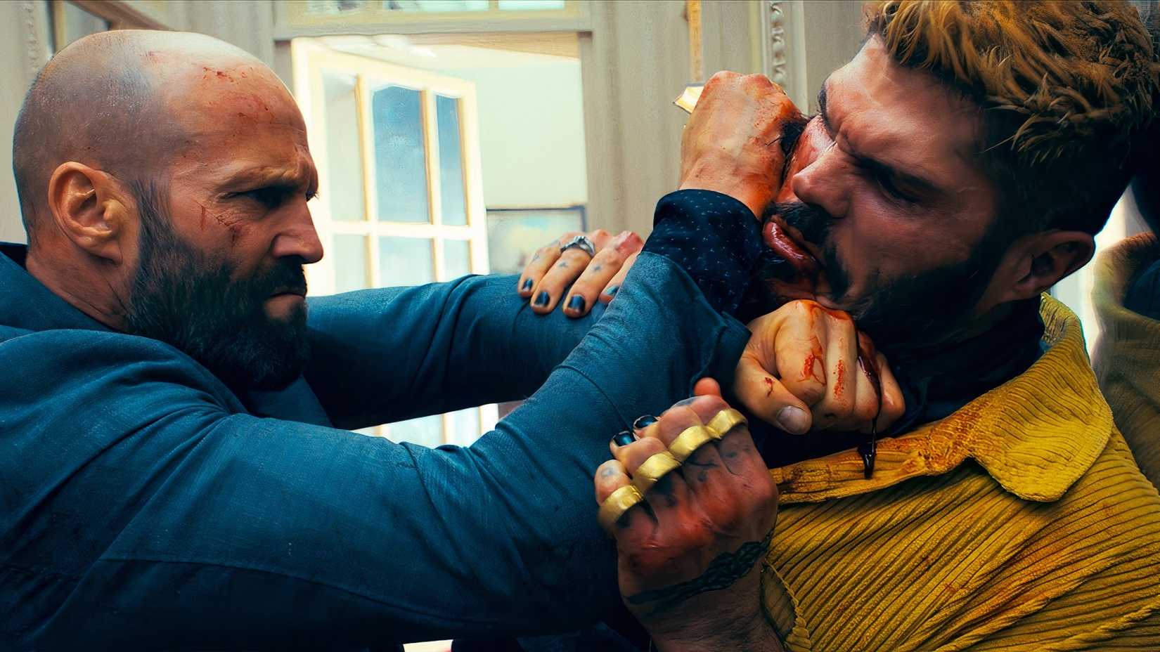 adam clay fights lazarus and stabs him in the neck in the film The Beekeeper