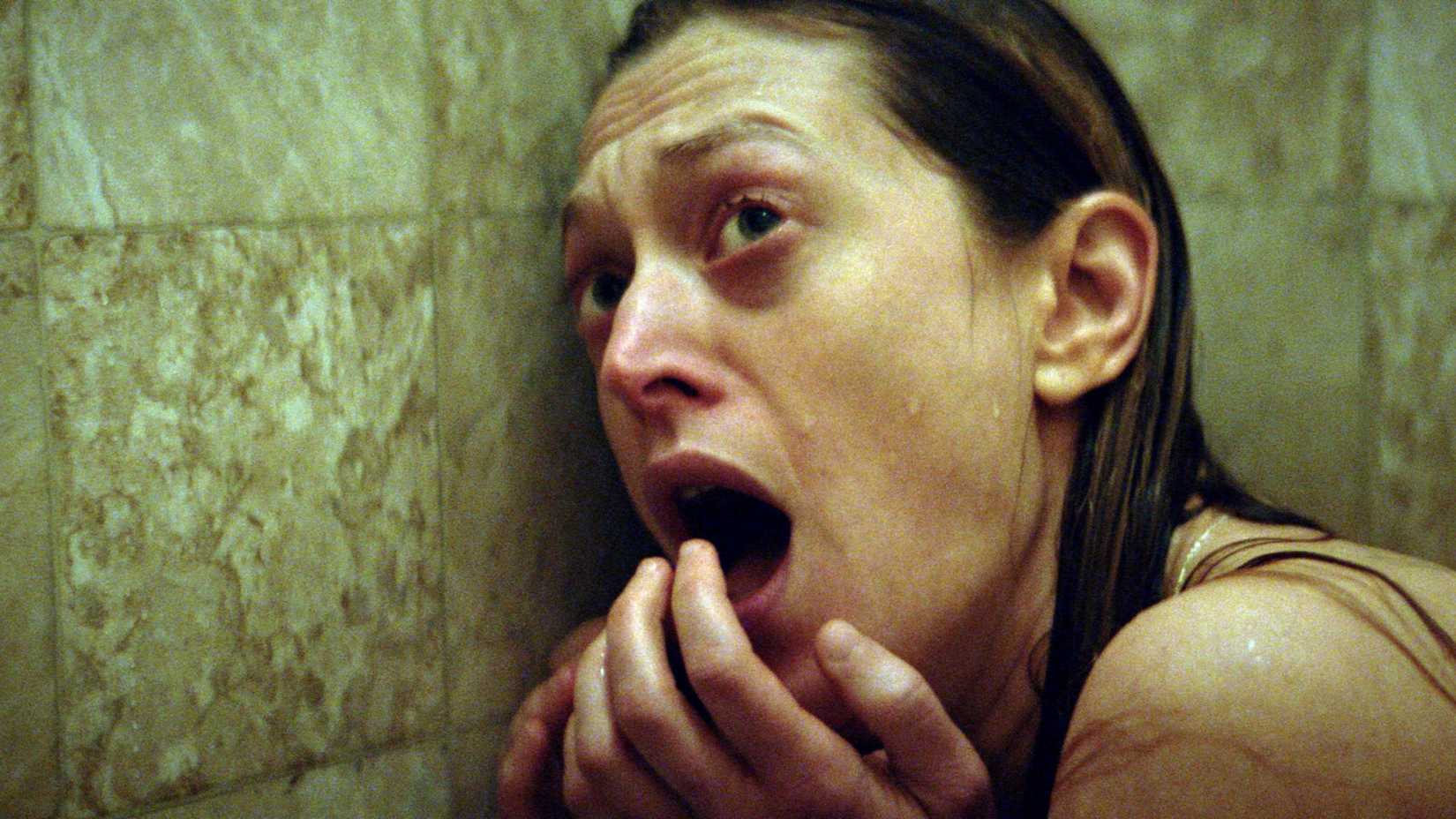 louise looks terrified while showering in the film the dark and the wicked