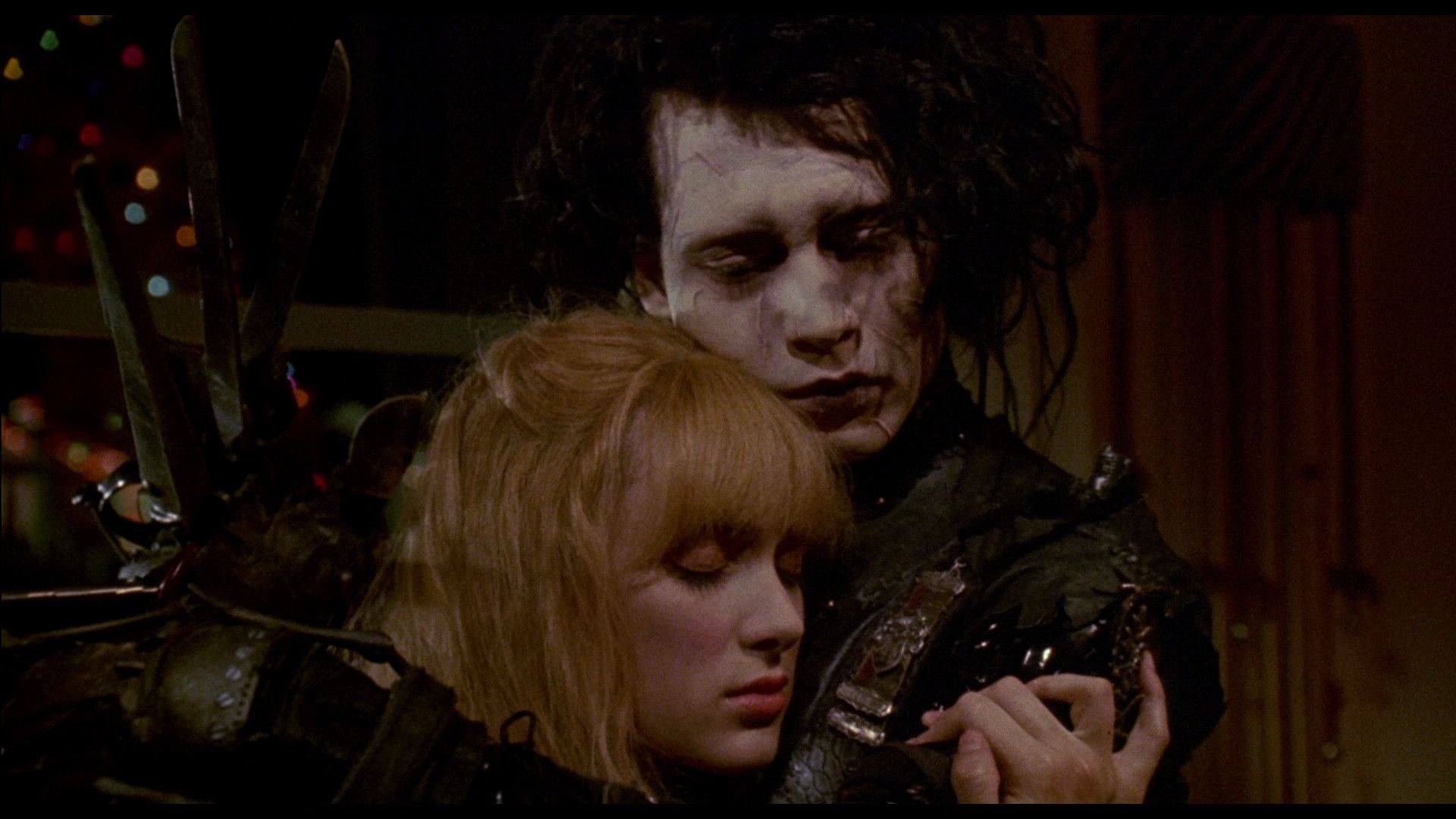 A couple embraces in Edward Scissorhands