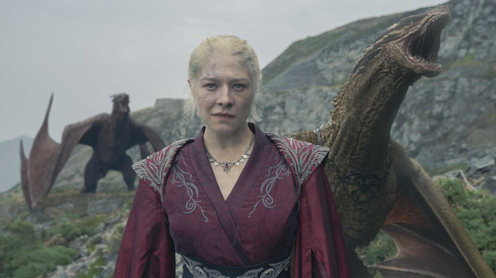 Emma D'Arcy as Queen Rhaenyra Targaryen stands with her dragons in a scene from House of the Dragon