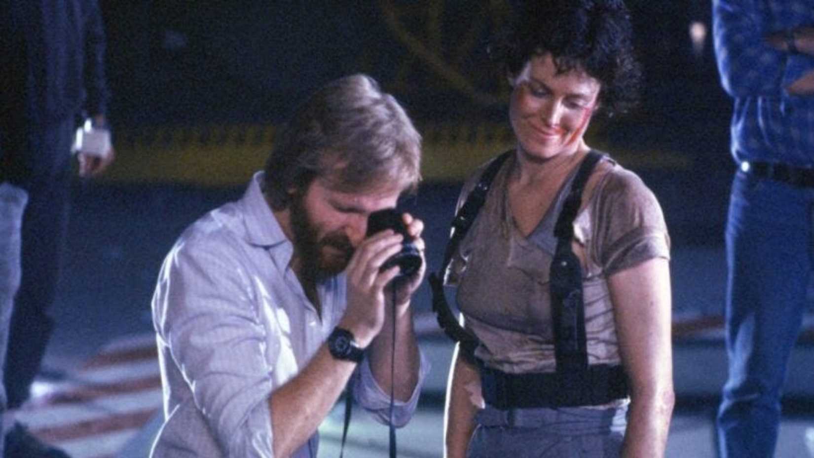 James Cameron on the set of Aliens with Sigourney Weaver