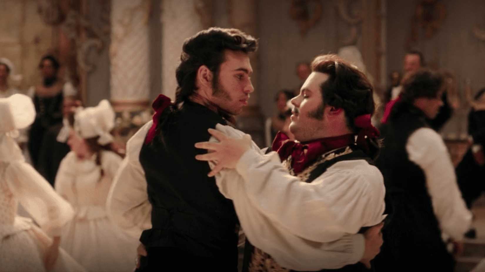 Josh Gad as LeFou dancing with a man in Beauty and the Beast