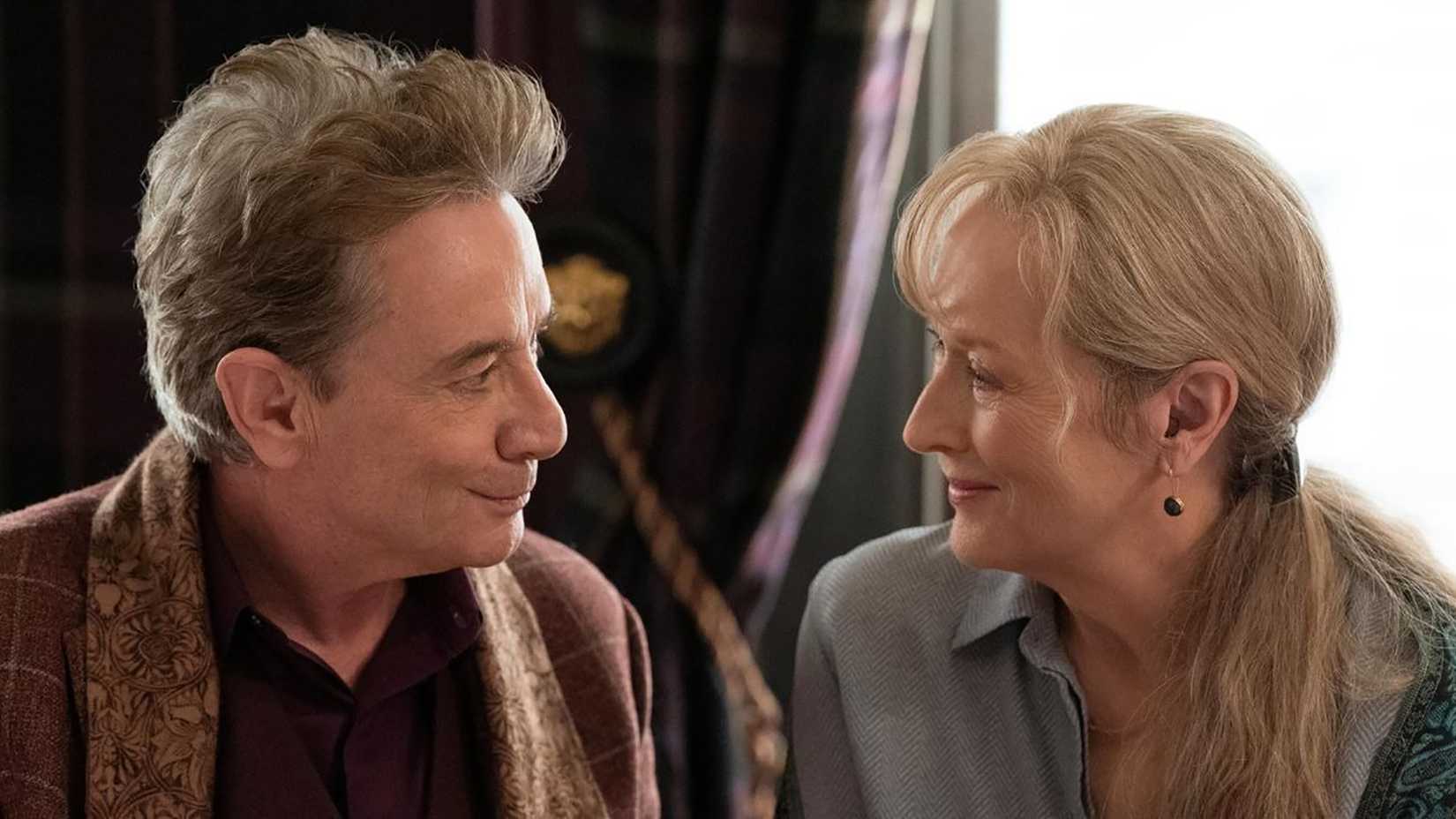 Oliver and Loretta looking lovingly at one another in Only Murders in the Building.