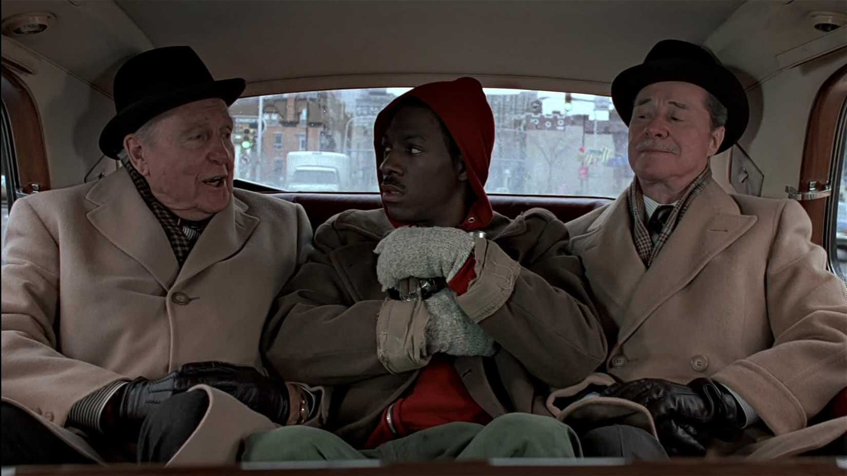 Ralph Bellamy and Don Ameche's Randolph and Mortimer Duke talking to Eddie Murphy's Billy Ray Valentine in Trading Places