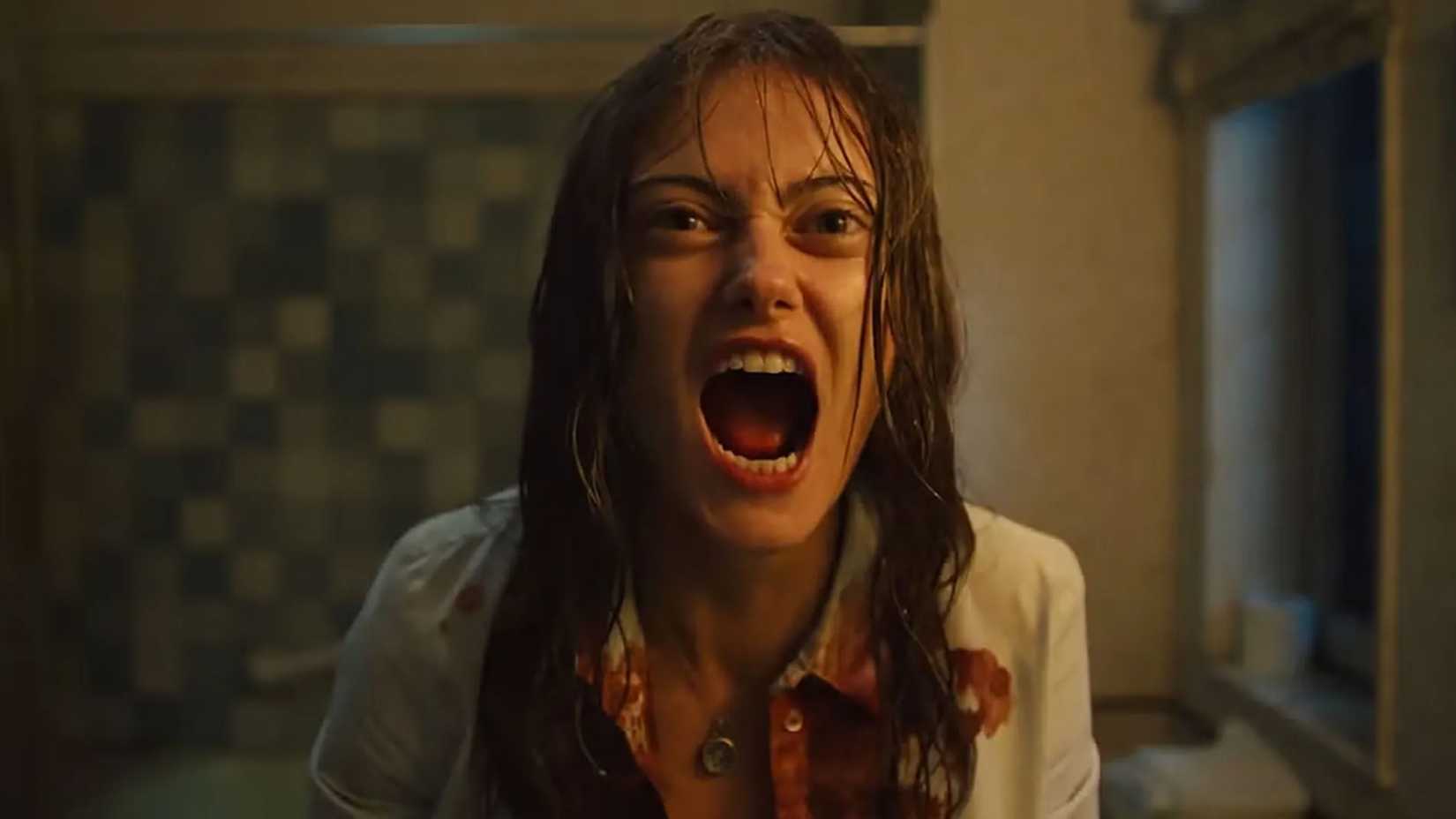 Rhiannon screams in the mirror, blood over her clothes in Sweetpea