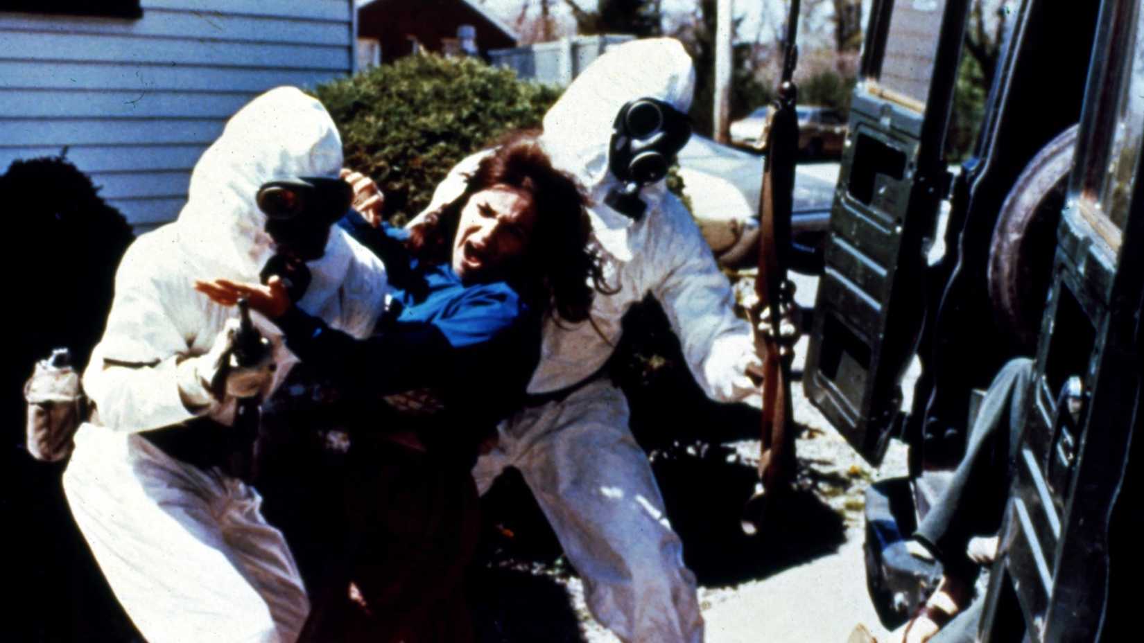 A violent woman is apprehended in The Crazies