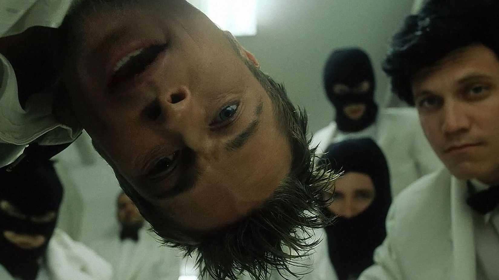 Brad Pitt looking at the camera in Fight Club