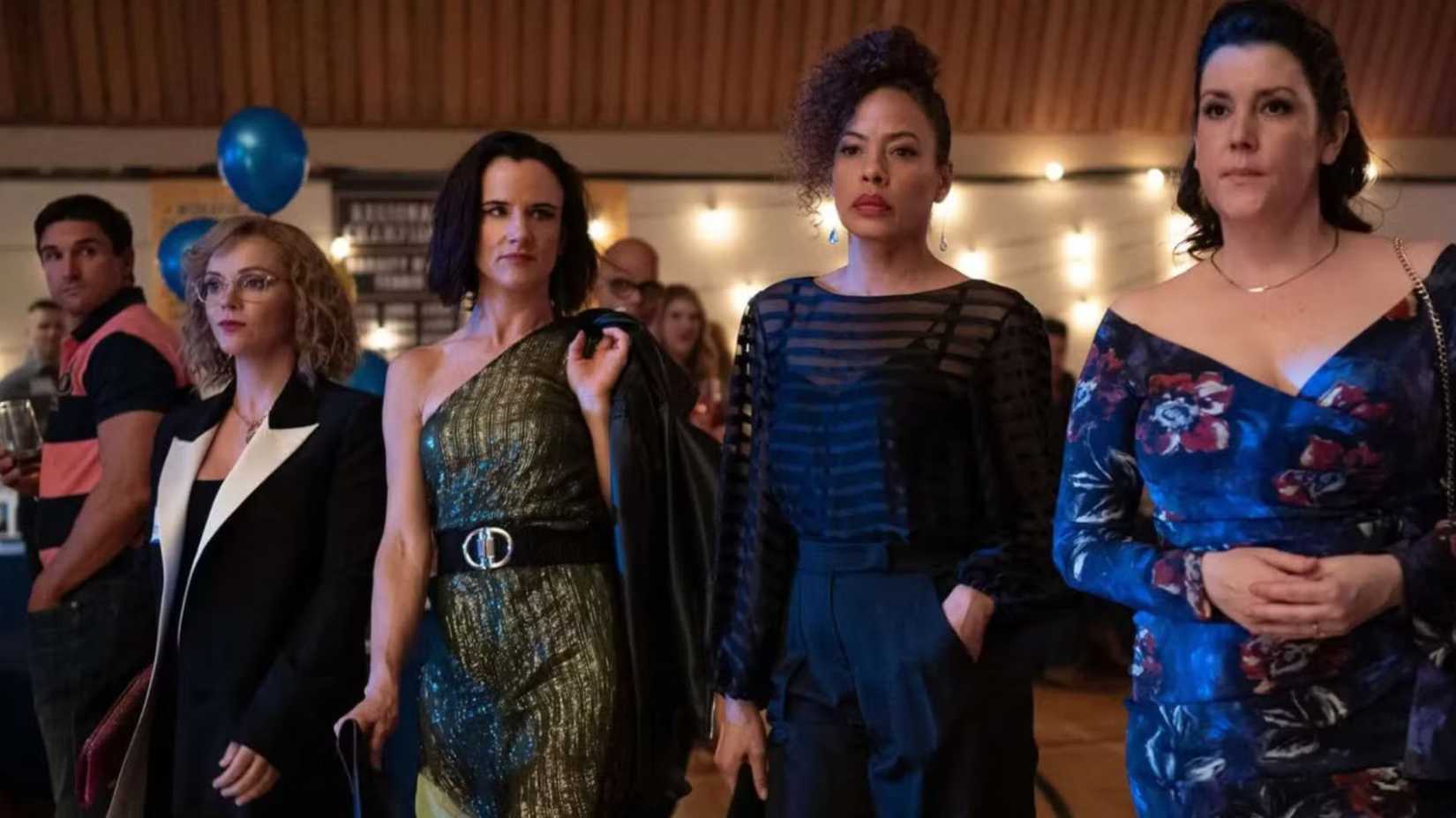 Melanie Lynskey, Tawny Cypress, Christina Ricci, and Juliette Lewis in dresses at a dance in Yellowjackets (2)