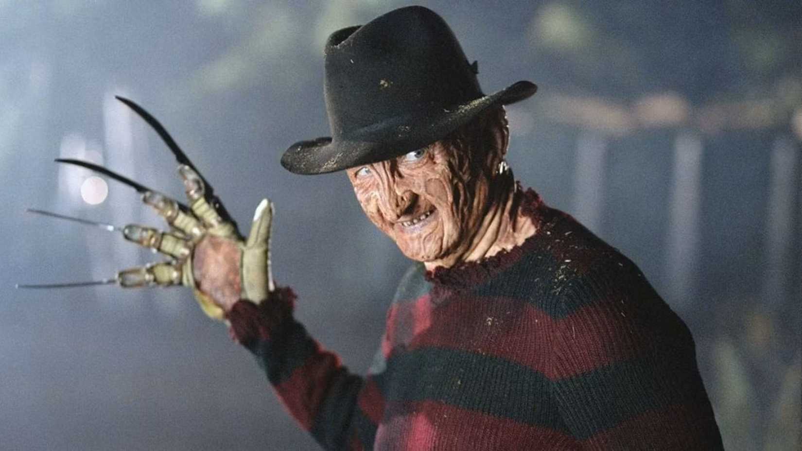 Freddy Krueger showing his blades in A Nightmare on Elm Street
