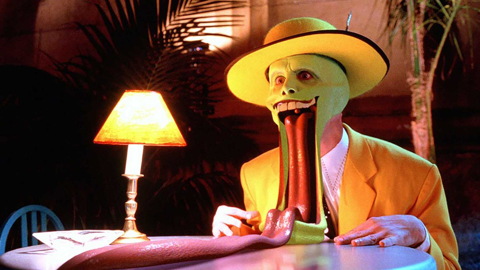 Stanley as the mask with his mouth melted to the table in The Mask