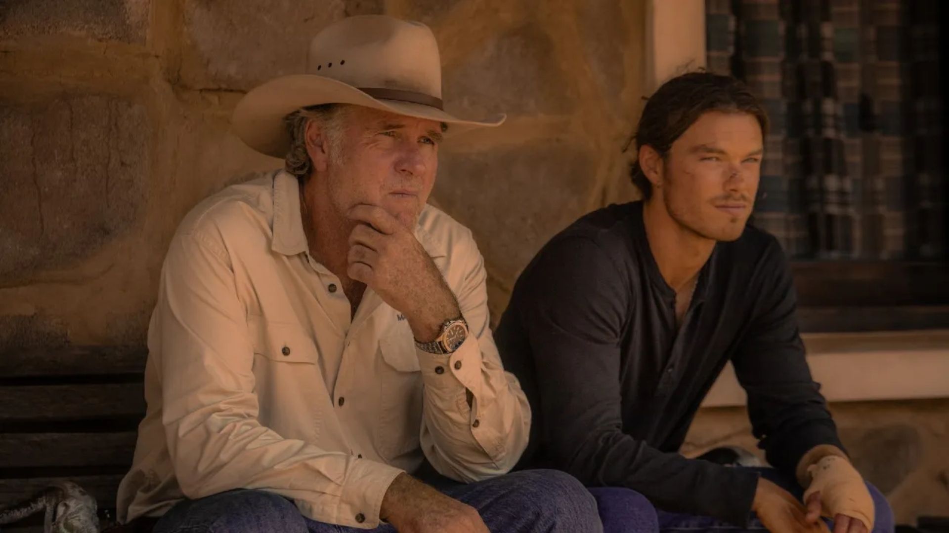 Two men sit and contemplate in Territory