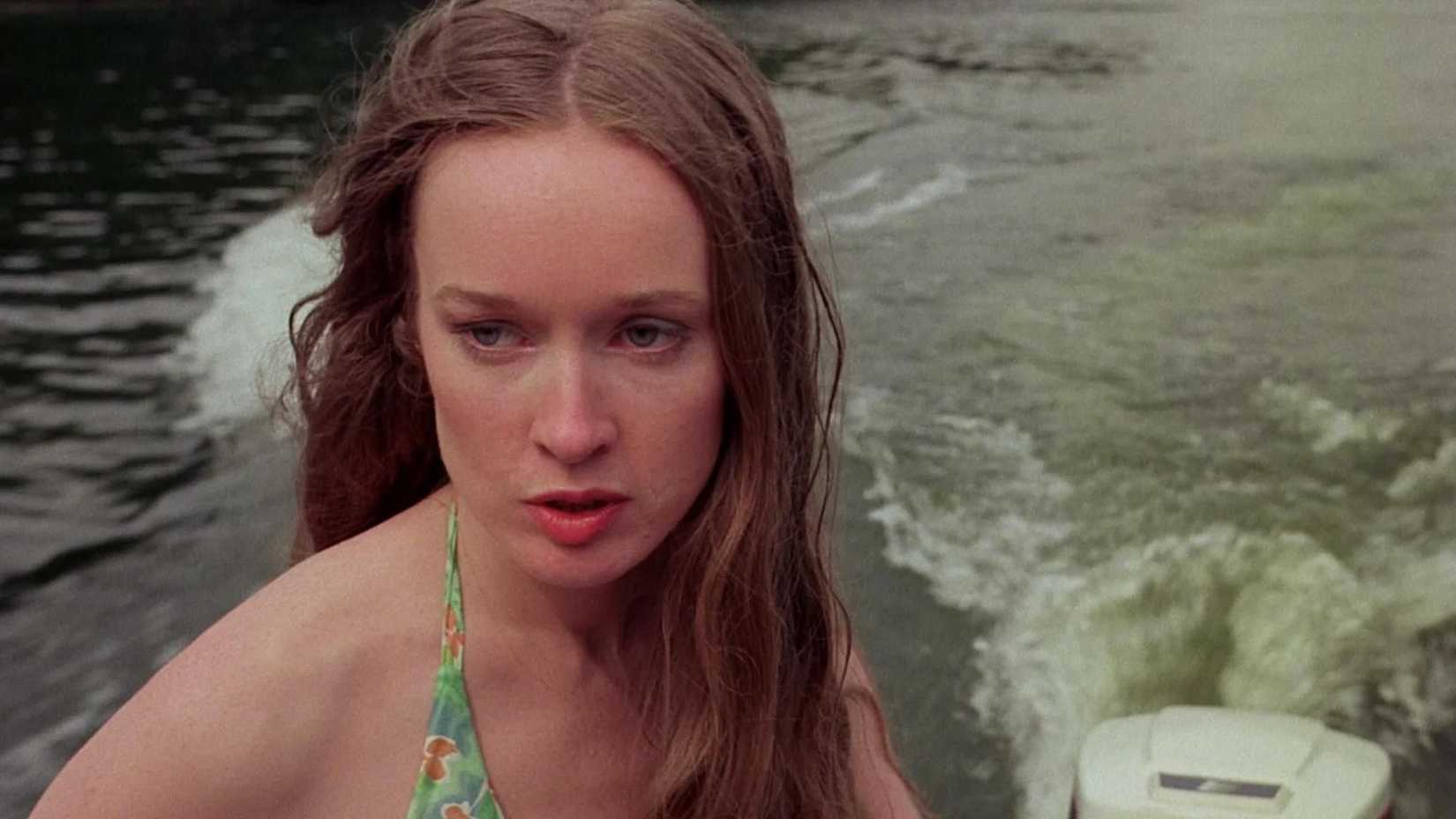Camille Keaton driving a boat in I Spit on Your Grave (1978)