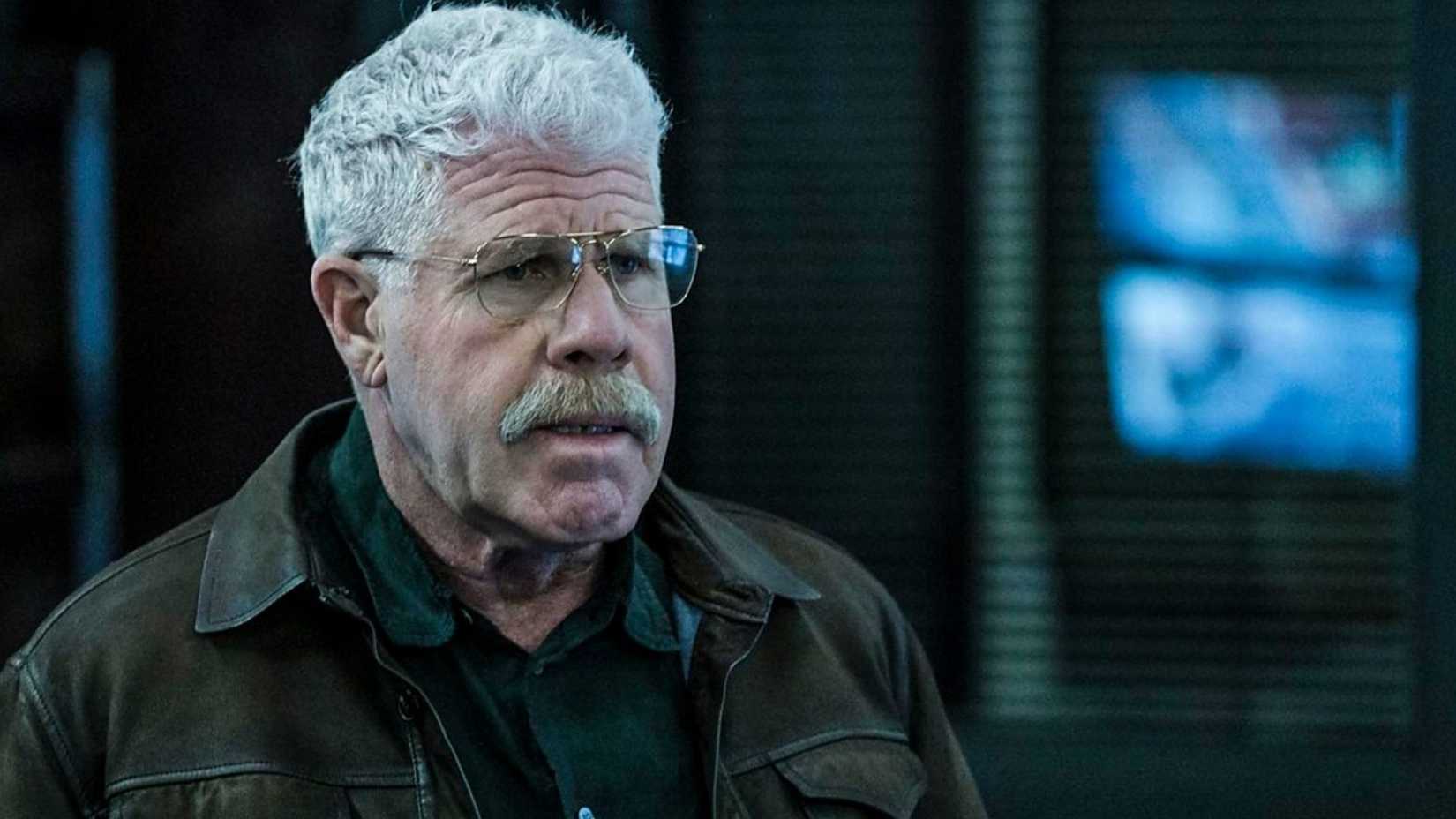 Ron Perlman as Frank Napier in The Capture