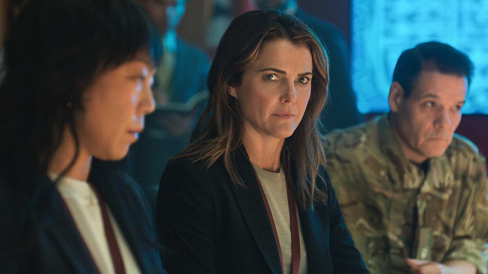 Kate sits in a bar in The Diplomat